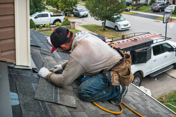 Professional Flat Roof Repair technician working in Eddyville, OR